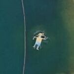 Floating Mystery Man, Southport, Australia